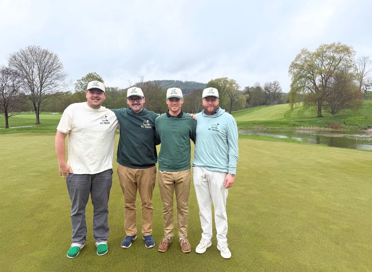 The four founders of All Square together on a golf course